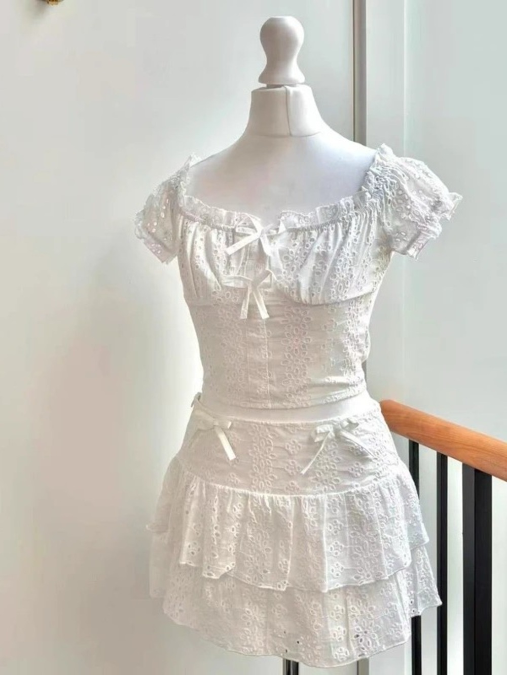 White Eyelet Maxi Dress with Ruffle Tiers and Bow Accents